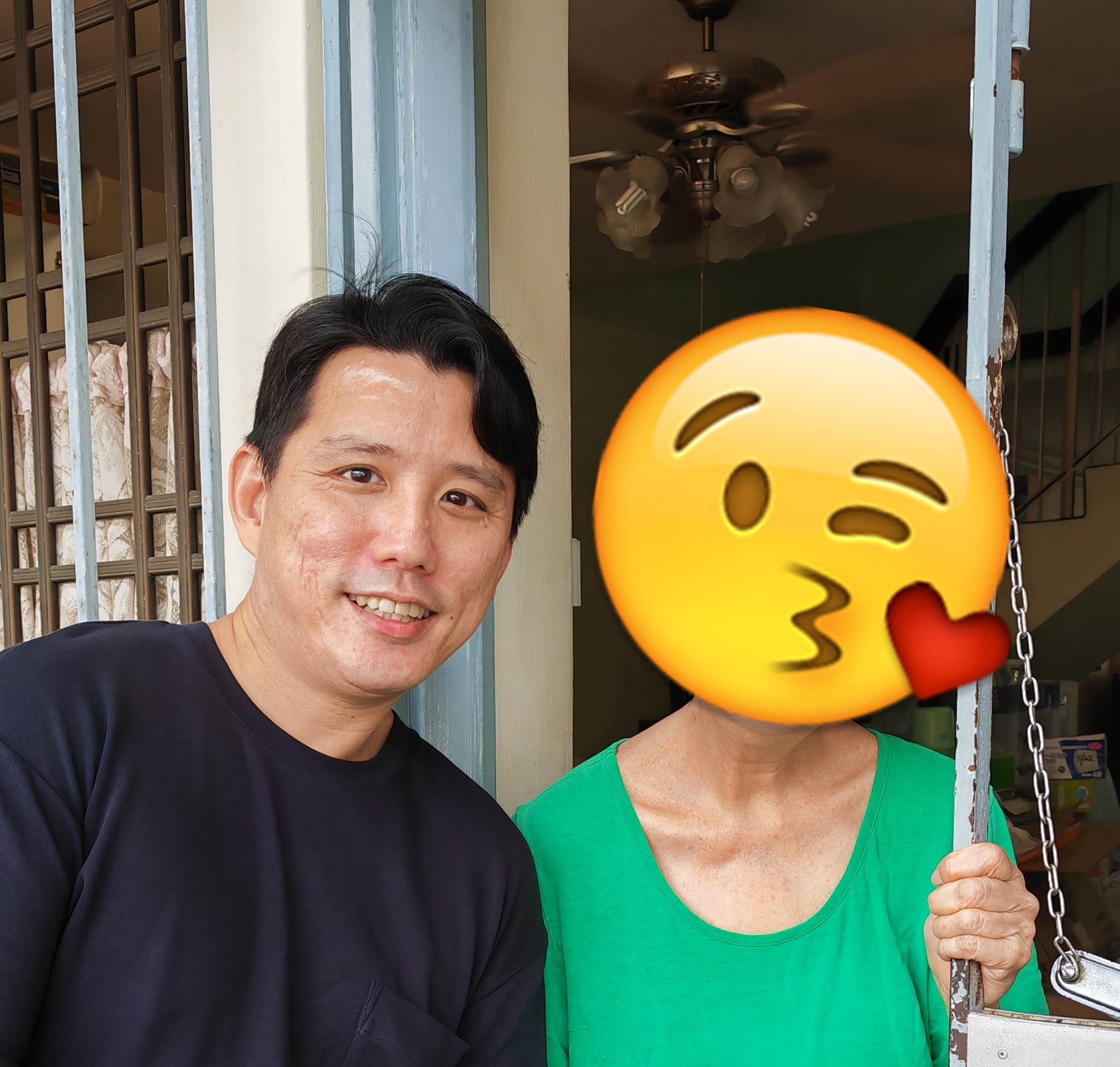 Ryan Lim Singapore property agent with satisfied client at property handover